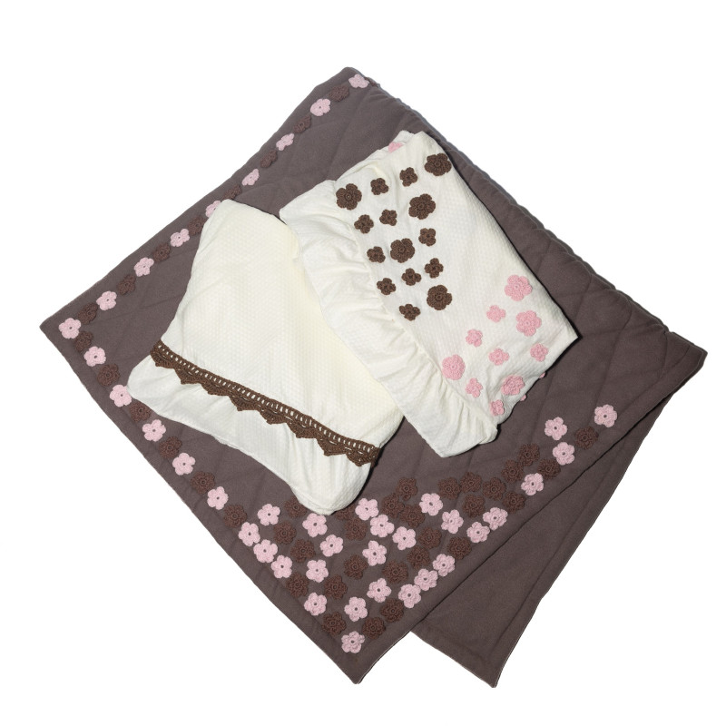 Brown floral prayer mat with a prayer set