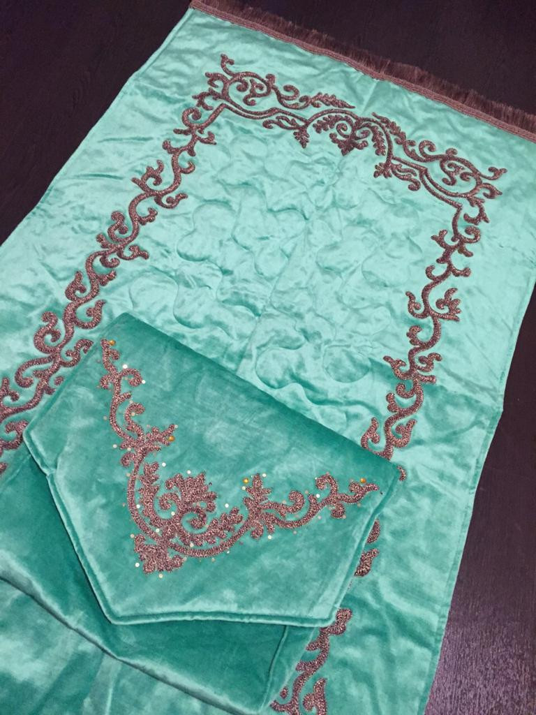 Embroidered prayer rug