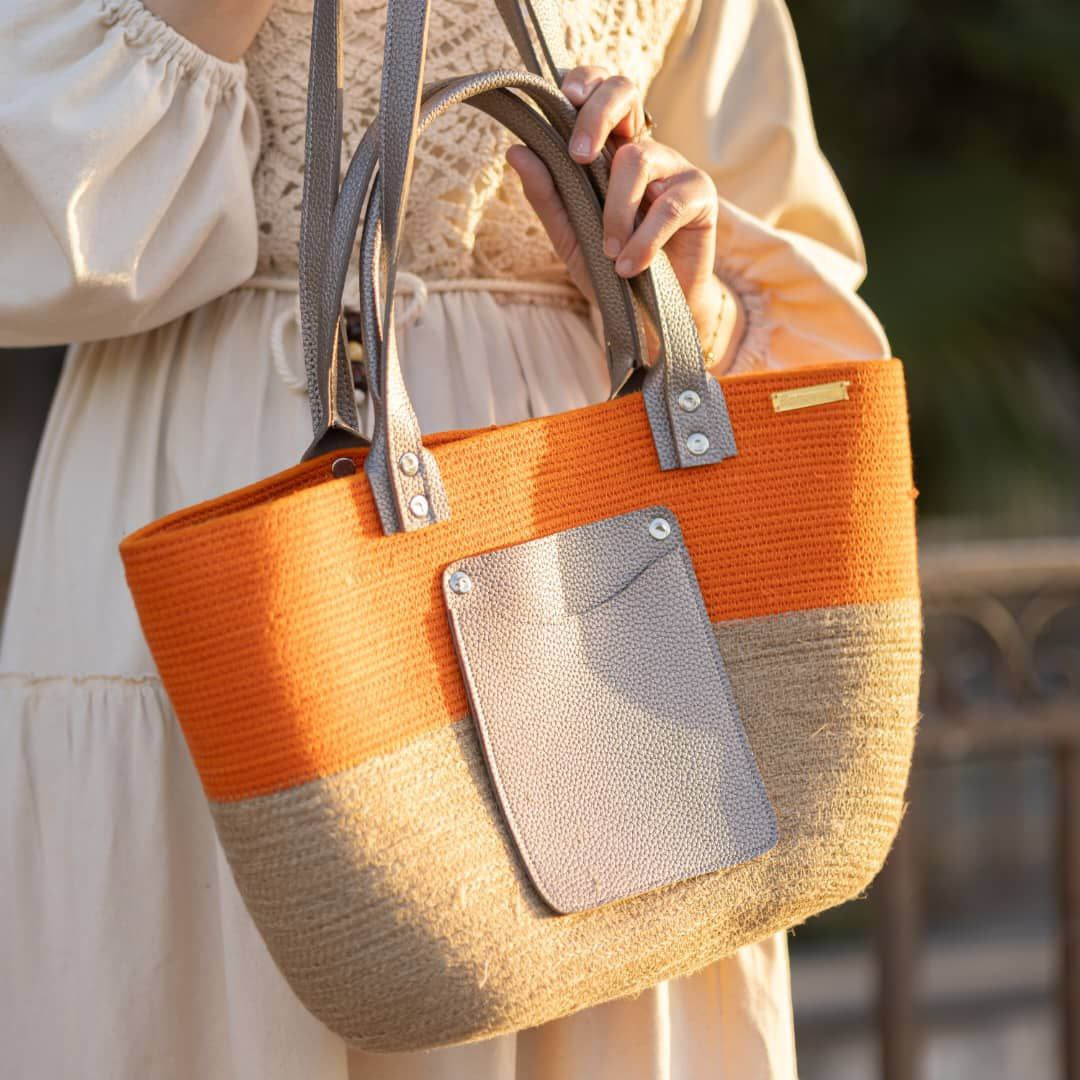 Half orange handbag